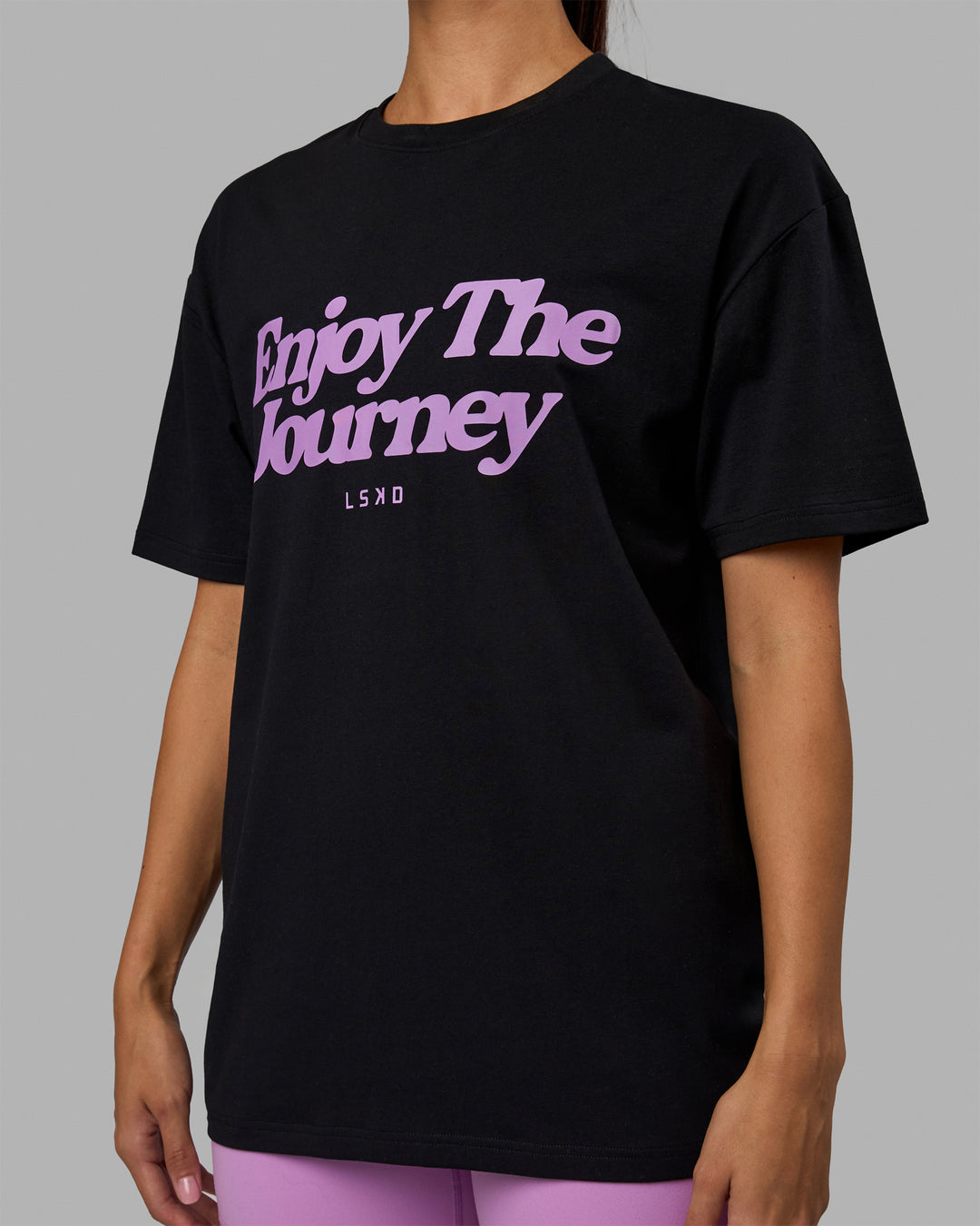 Woman wearing Unisex Enjoy The Journey FLXCotton Tee Oversize - Black-Light Violet - view 10