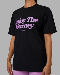 Woman wearing Unisex Enjoy The Journey FLXCotton Tee Oversize - Black-Light Violet | Thumbnail Index: 9