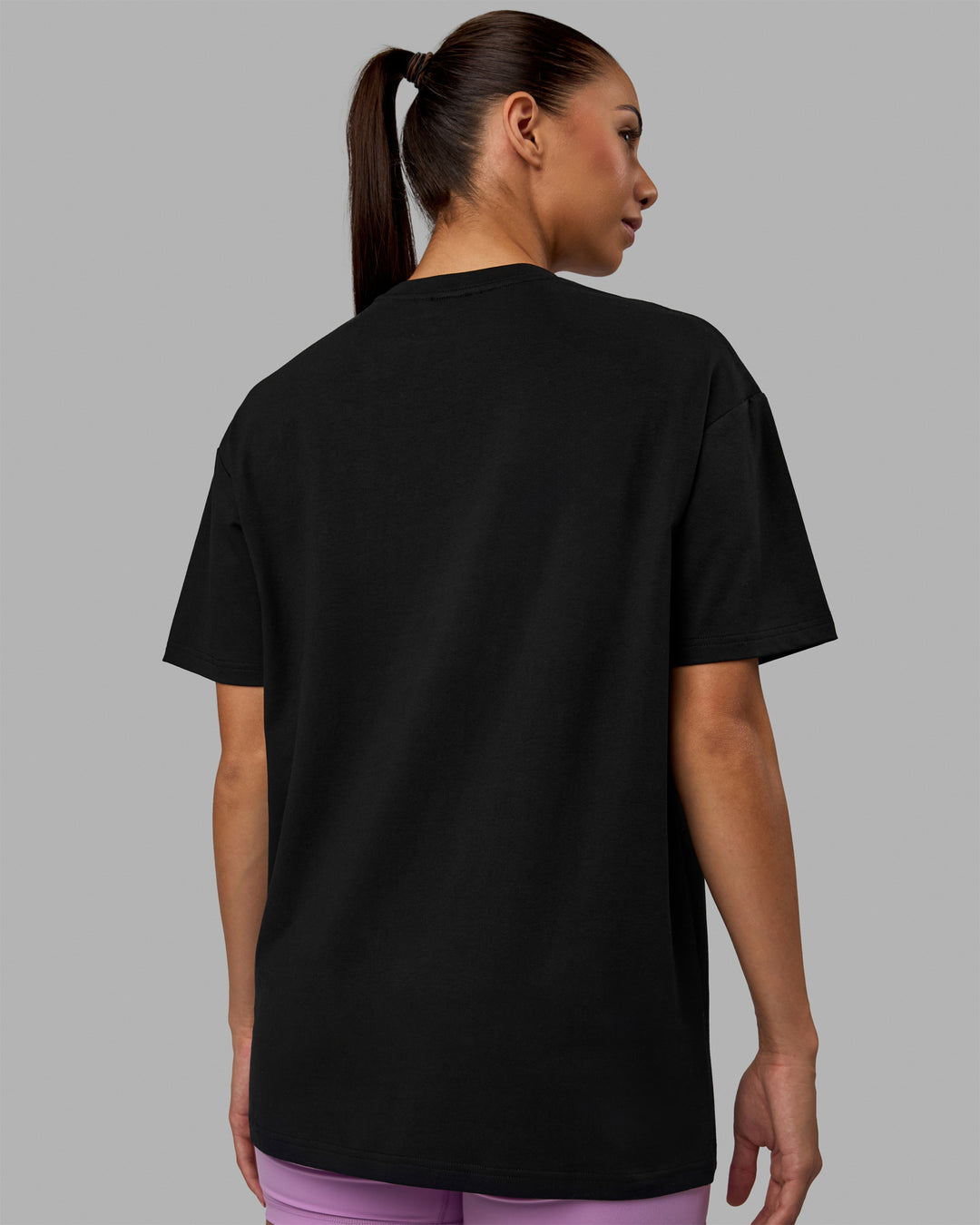 Woman wearing Unisex Enjoy The Journey FLXCotton Tee Oversize - Black-Light Violet - view 4