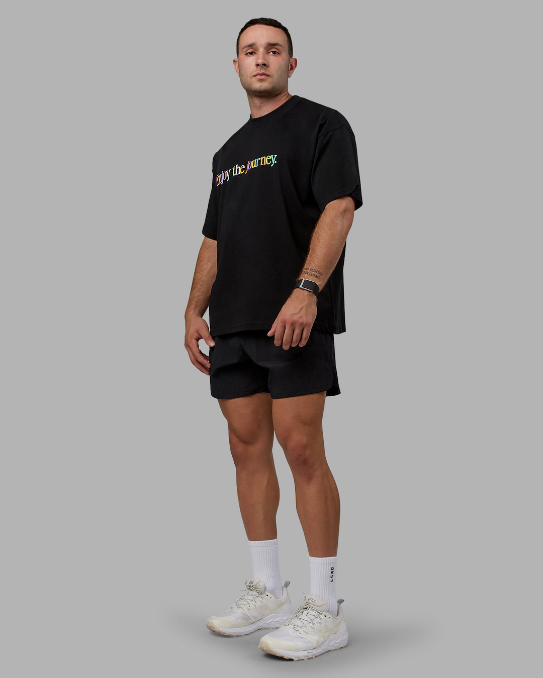 Man wearing Unisex Enjoy The Journey Heavyweight Tee Oversize - Black-Multi - view 5