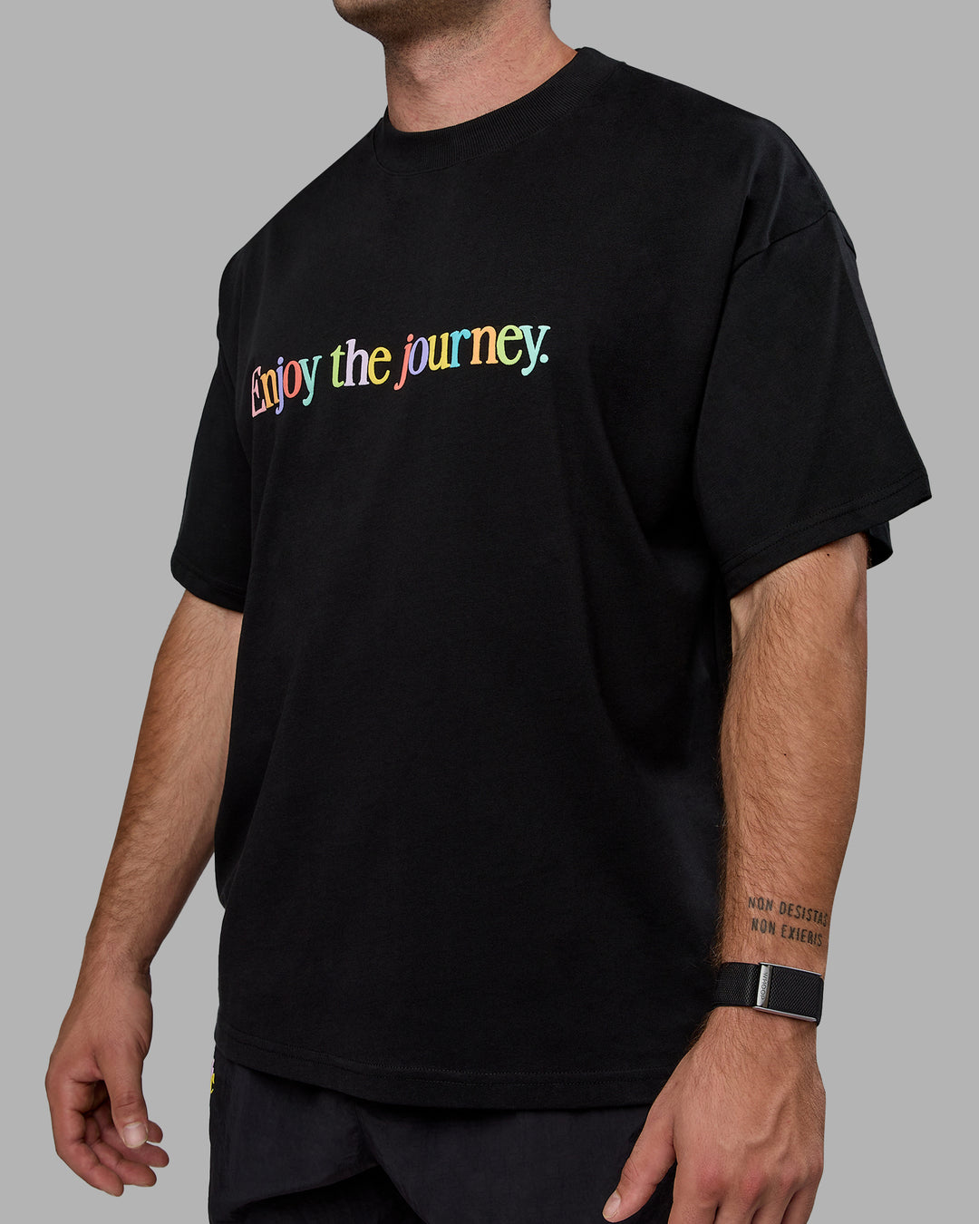 Man wearing Unisex Enjoy The Journey Heavyweight Tee Oversize - Black-Multi - view 11