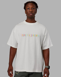 Man wearing Unisex Enjoy The Journey Heavyweight Tee Oversize - Off White-Multi | Thumbnail Index: 5