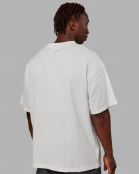 Man wearing Unisex Enjoy The Journey Heavyweight Tee Oversize - Off White-Multi | Thumbnail Index: 3
