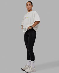 Woman wearing Unisex Enjoy The Journey Heavyweight Tee Oversize - Off White-Multi | Thumbnail Index: 4