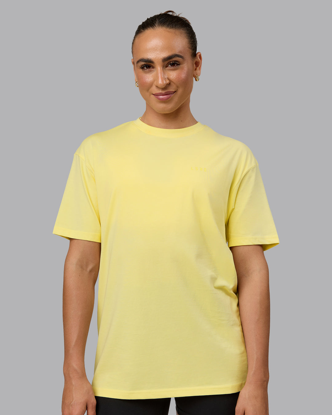 Woman wearing Unisex Enjoy the Journey Value Series FLXCotton Tee Oversize - Pale Yellow-Sundress - view 3