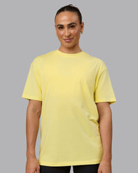 Woman wearing Unisex Enjoy the Journey Value Series FLXCotton Tee Oversize - Pale Yellow-Sundress | Thumbnail Index: 2