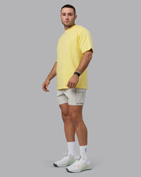 Man wearing Unisex Enjoy the Journey Value Series FLXCotton Tee Oversize - Pale Yellow-Sundress | Thumbnail Index: 5