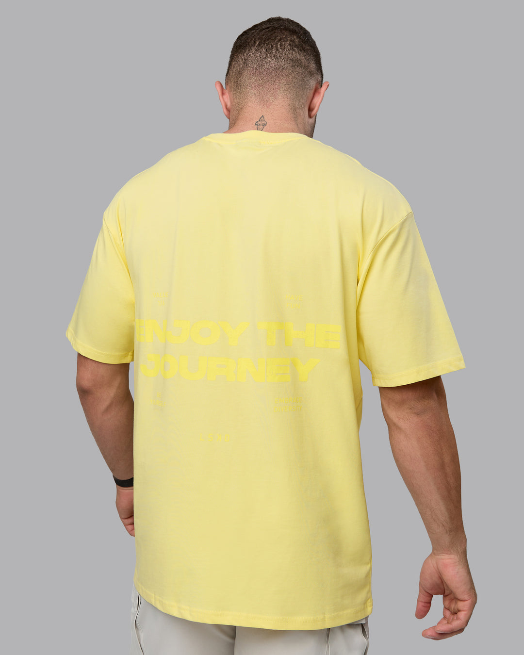 Man wearing Unisex Enjoy the Journey Value Series FLXCotton Tee Oversize - Pale Yellow-Sundress - view 7