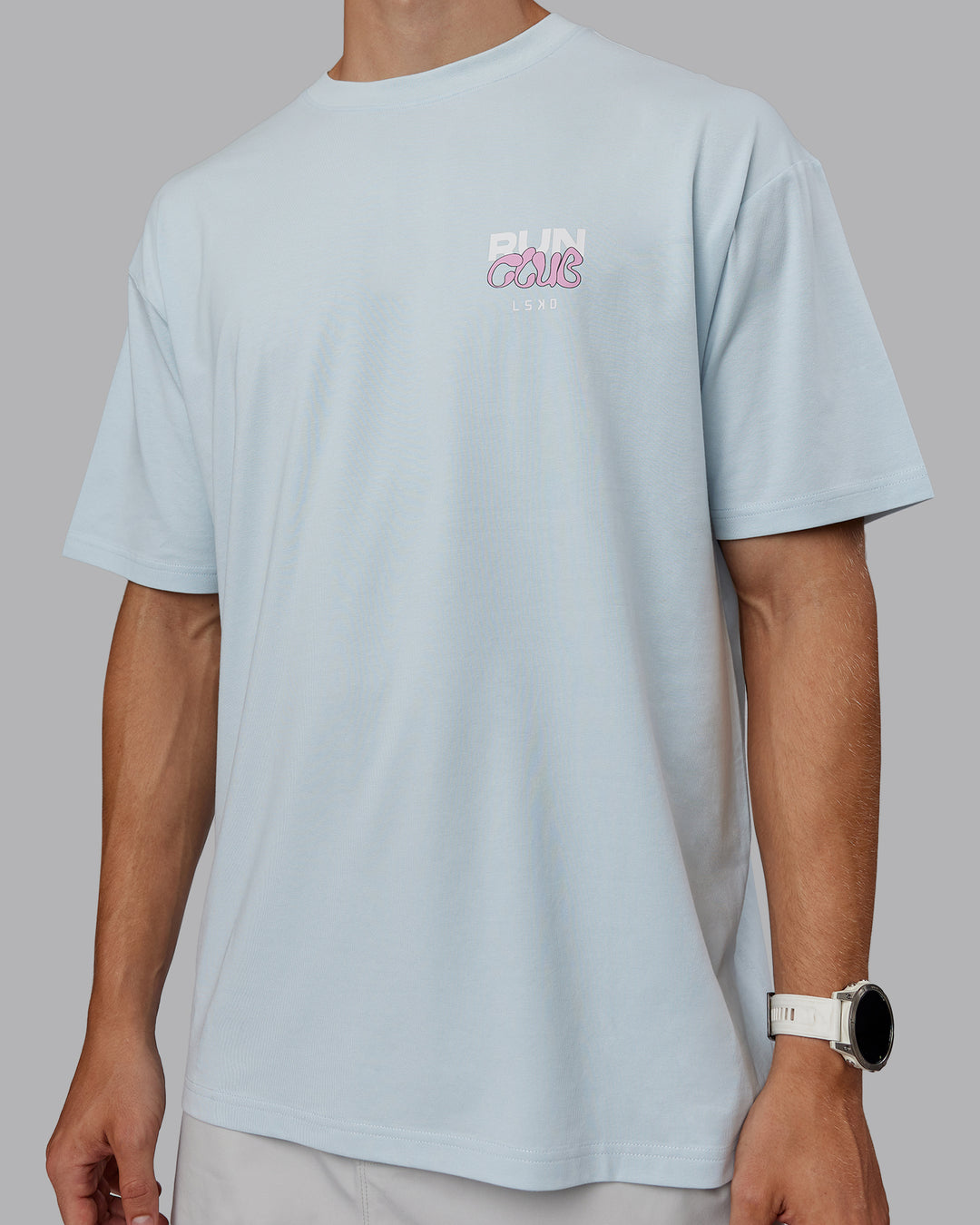 Man wearing Unisex Gone Running FLXCotton Tee Oversize - Skyride-Bubblegum - view 8