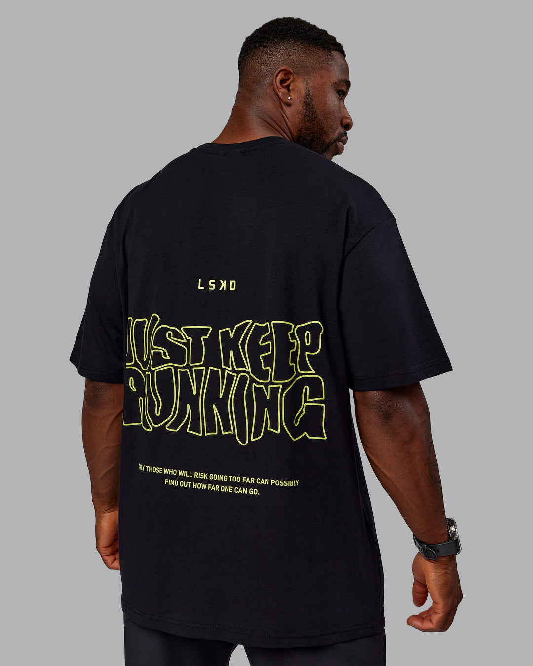 Man wearing Unisex Leg It FLXCotton Tee Oversize - Black-Volt - view 9