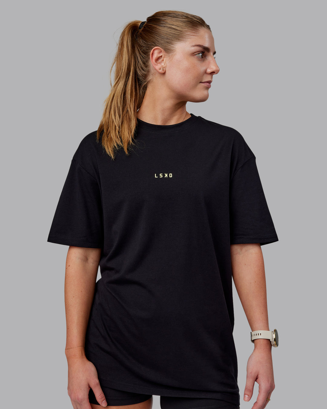 Woman wearing Unisex Leg It FLXCotton Tee Oversize - Black-Volt - view 6