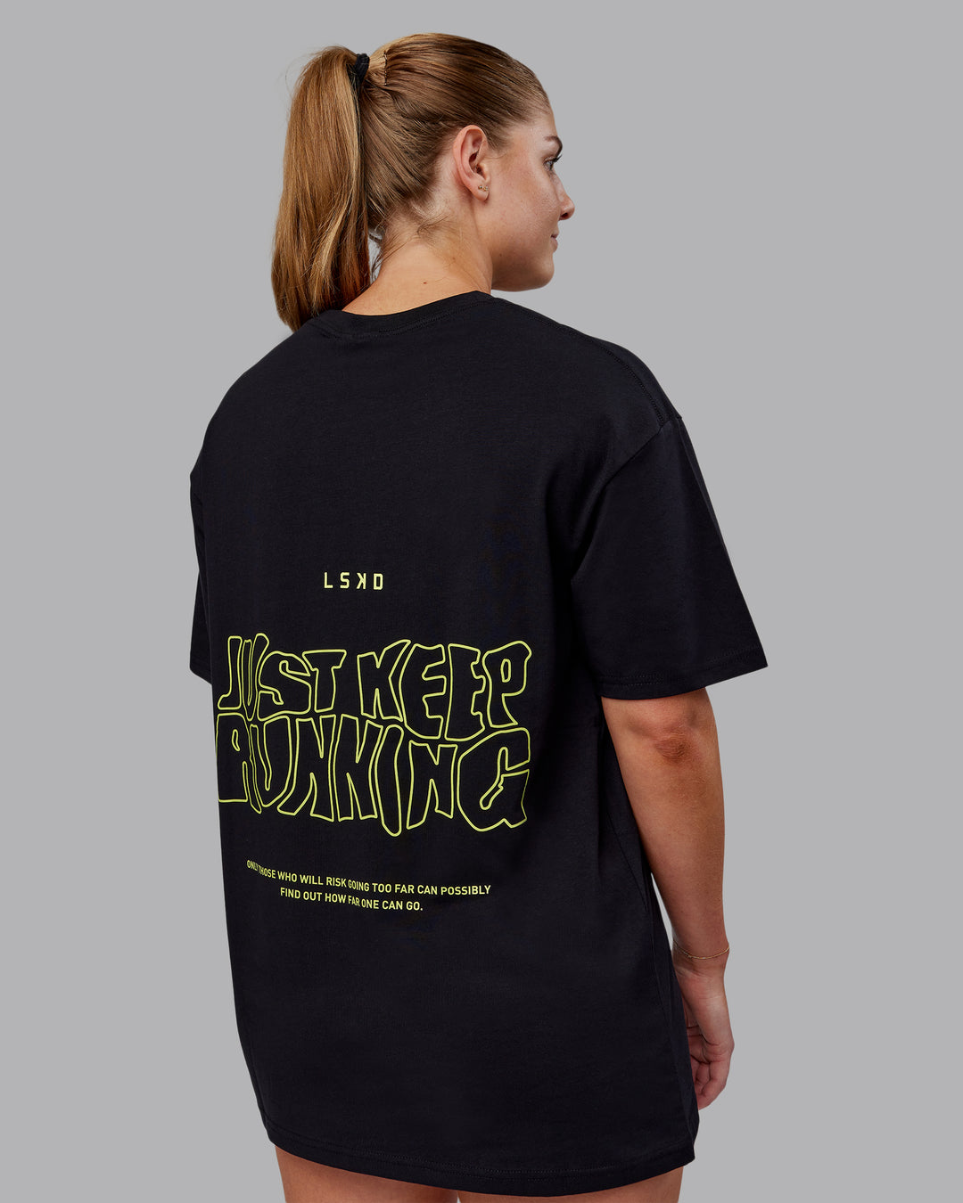 Woman wearing Unisex Leg It FLXCotton Tee Oversize - Black-Volt - view 2