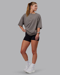 Woman wearing Unisex Leg It FLXCotton Tee Oversize - Storm Front-Black | Thumbnail Index: 4