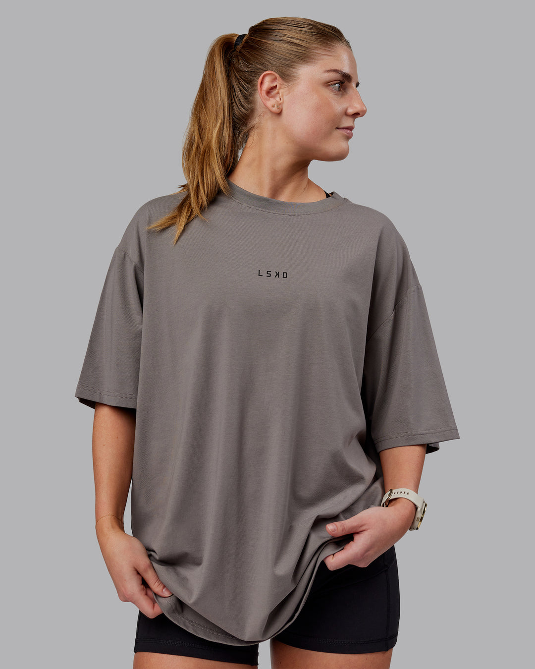 Woman wearing Unisex Leg It FLXCotton Tee Oversize - Storm Front-Black - view 3