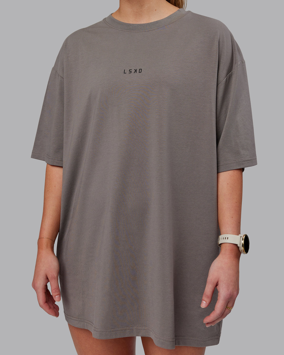 Woman wearing Unisex Leg It FLXCotton Tee Oversize - Storm Front-Black - view 9