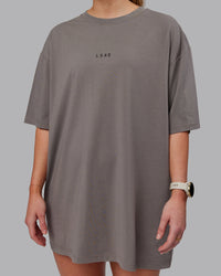 Woman wearing Unisex Leg It FLXCotton Tee Oversize - Storm Front-Black | Thumbnail Index: 8