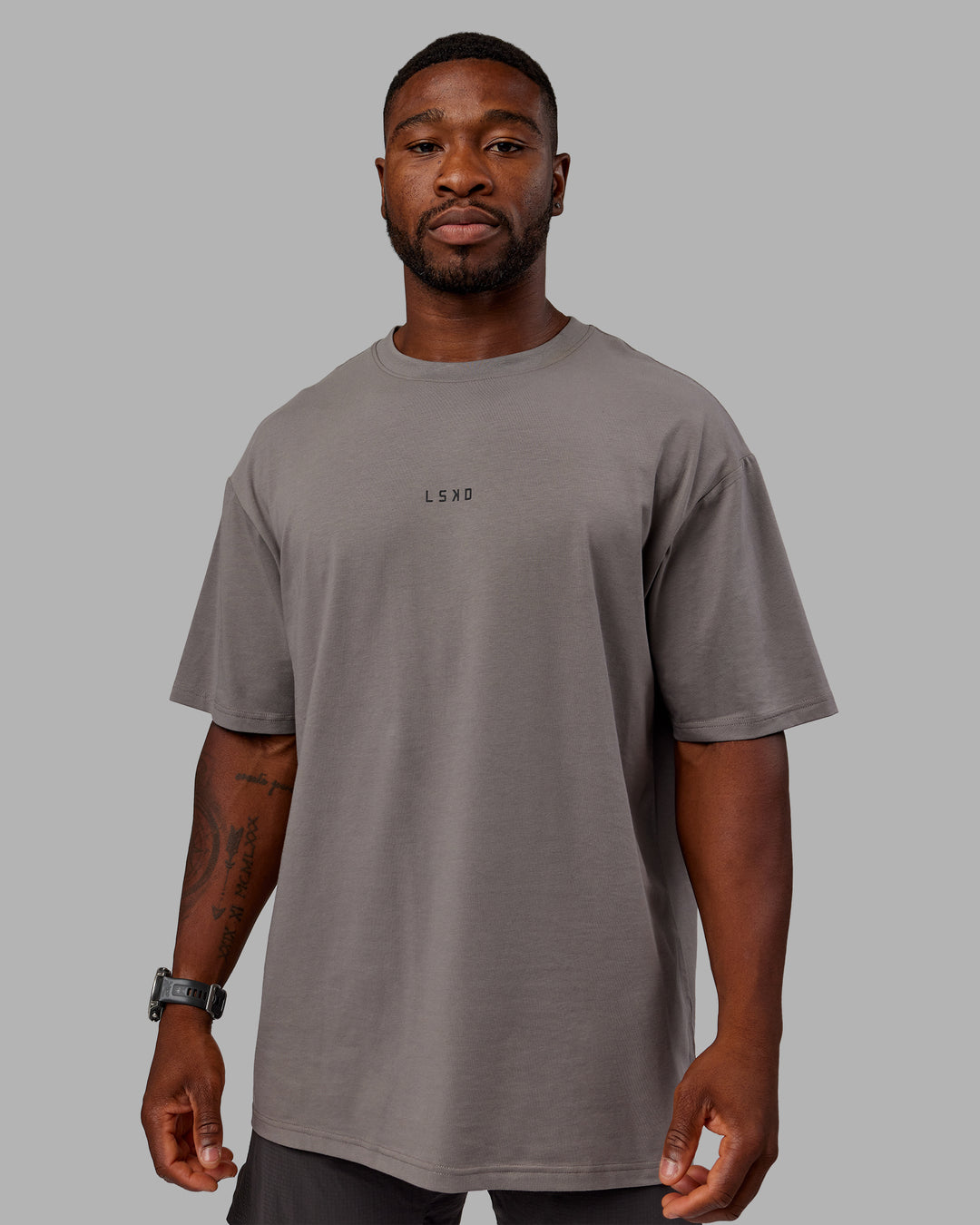 Man wearing Unisex Leg It FLXCotton Tee Oversize - Storm Front-Black - view 4