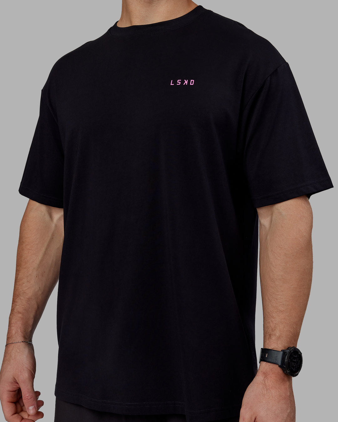 Man wearing Unisex Lift-Up FLXCotton Tee Oversize - Black-Fuschia Pink - view 8