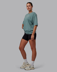 Woman wearing Unisex Washed Lifting Club Heavyweight Tee Oversize - Storm-Black | Thumbnail Index: 5