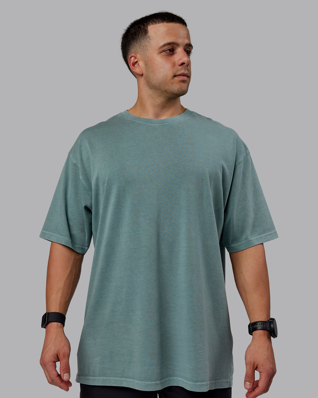 Man wearing Unisex Washed Lifting Club Heavyweight Tee Oversize - Storm-Black - view 2