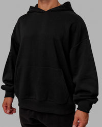 Man wearing Unisex Love The Run Hoodie Oversize - Black-White | Thumbnail Index: 10