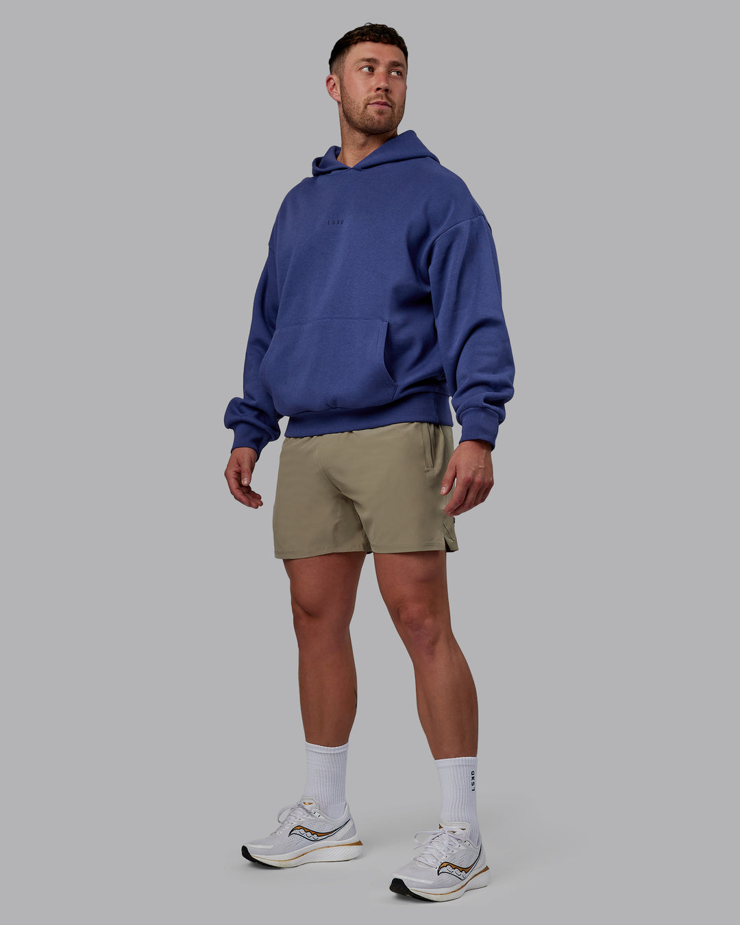 Man wearing Unisex MVP Hoodie Oversize - Future Dusk - view 8