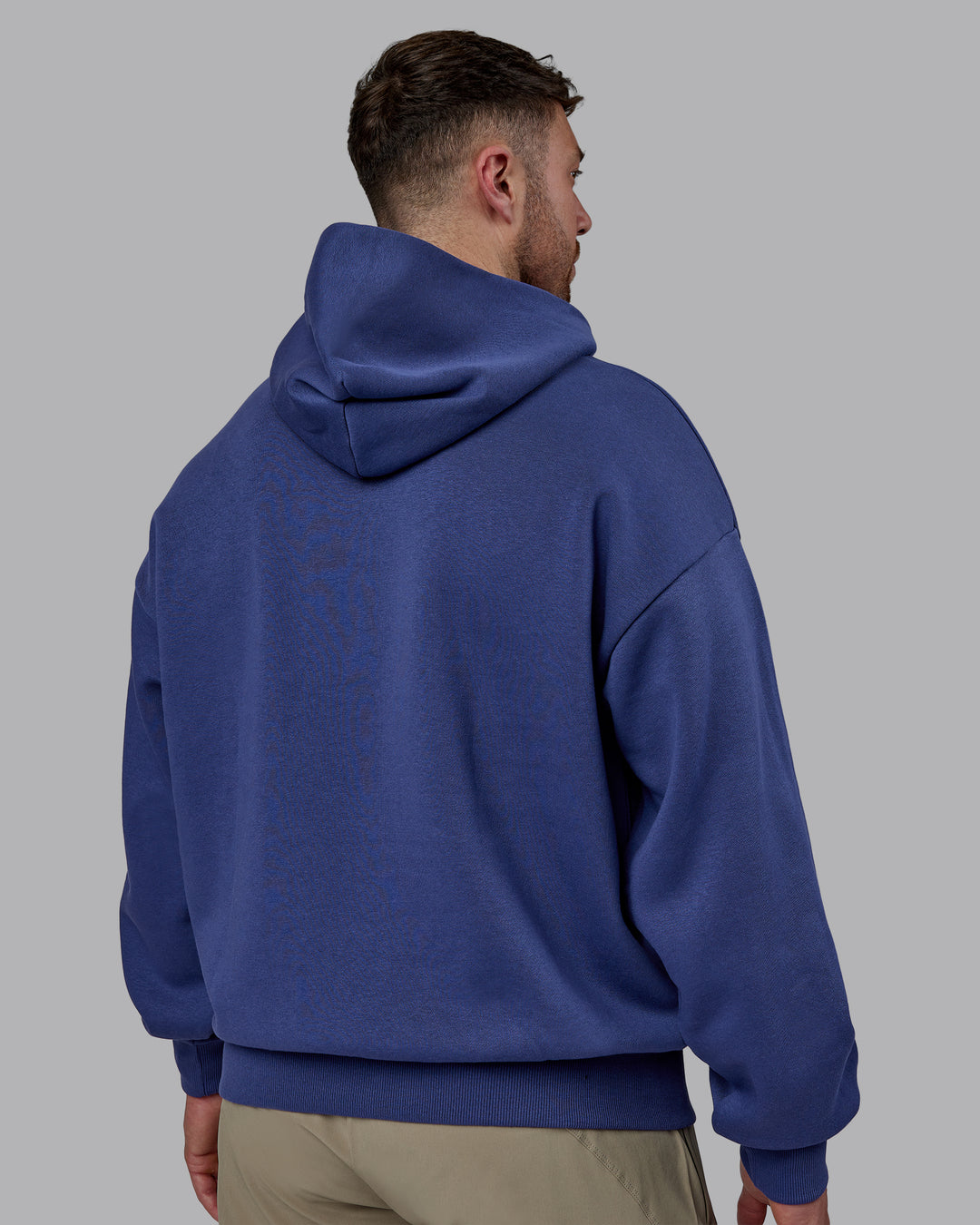 Man wearing Unisex MVP Hoodie Oversize - Future Dusk - view 4