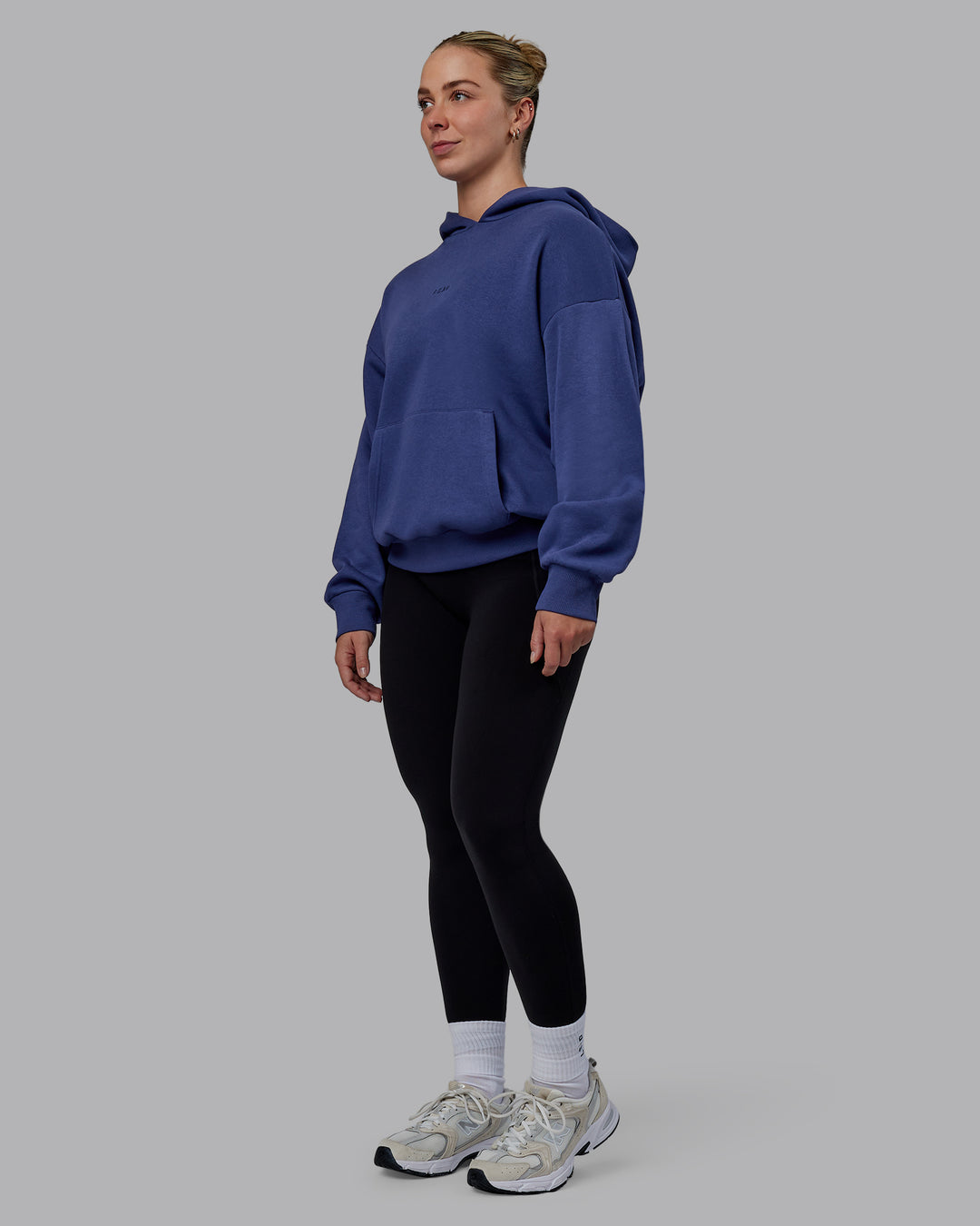 Woman wearing Unisex MVP Hoodie Oversize - Future Dusk - view 7