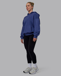 Woman wearing Unisex MVP Hoodie Oversize - Future Dusk | Thumbnail Index: 6