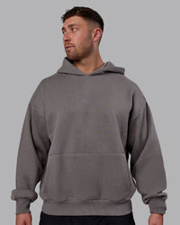 Man wearing Unisex MVP Hoodie Oversize - Storm Front | Thumbnail Index: 5