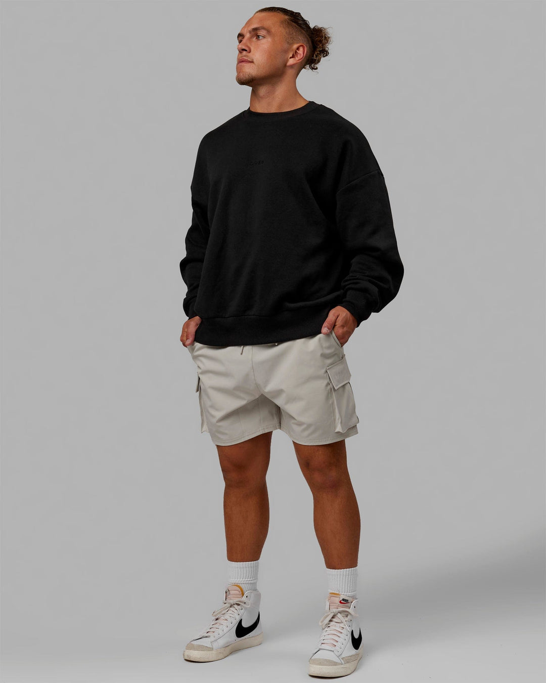 Man wearing Unisex MVP Sweater Oversize - Black - view 11