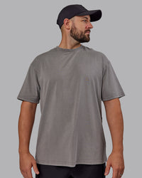 Man wearing Unisex Miami25 Washed FLXCotton Tee Oversize - Storm Front-Lemon Fizz | Thumbnail Index: 3
