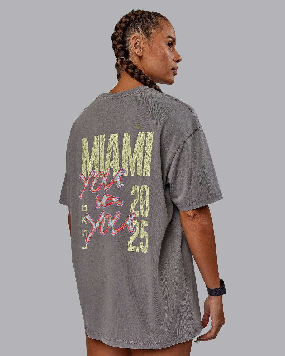 Woman wearing Unisex Miami25 Washed FLXCotton Tee Oversize - Storm Front-Lemon Fizz - view 5