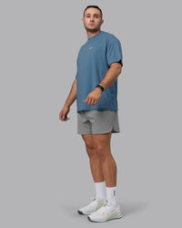 Man wearing Unisex Move Fast Value Series FLXCotton Tee Oversize - Elemental Blue-Off White | Thumbnail Index: 5