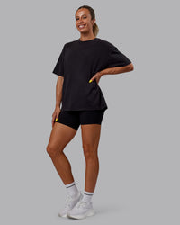 Woman wearing Unisex Washed Pressure Heavyweight Tee Oversize - Black-White | Thumbnail Index: 7