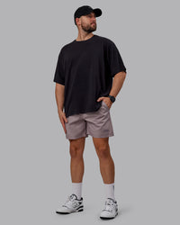 Man wearing Unisex Washed Pressure Heavyweight Tee Oversize - Black-White | Thumbnail Index: 5