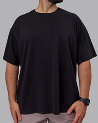 Man wearing Unisex Washed Pressure Heavyweight Tee Oversize - Black-White | Thumbnail Index: 9
