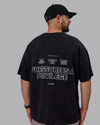 Man wearing Unisex Washed Pressure Heavyweight Tee Oversize - Black-White | Thumbnail Index: 2