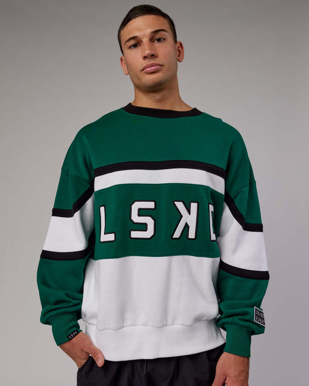 Man wearing Unisex PrimeTime Sweater Oversize - Malachite-White - view 3
