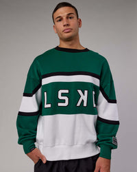 Man wearing Unisex PrimeTime Sweater Oversize - Malachite-White | Thumbnail Index: 2