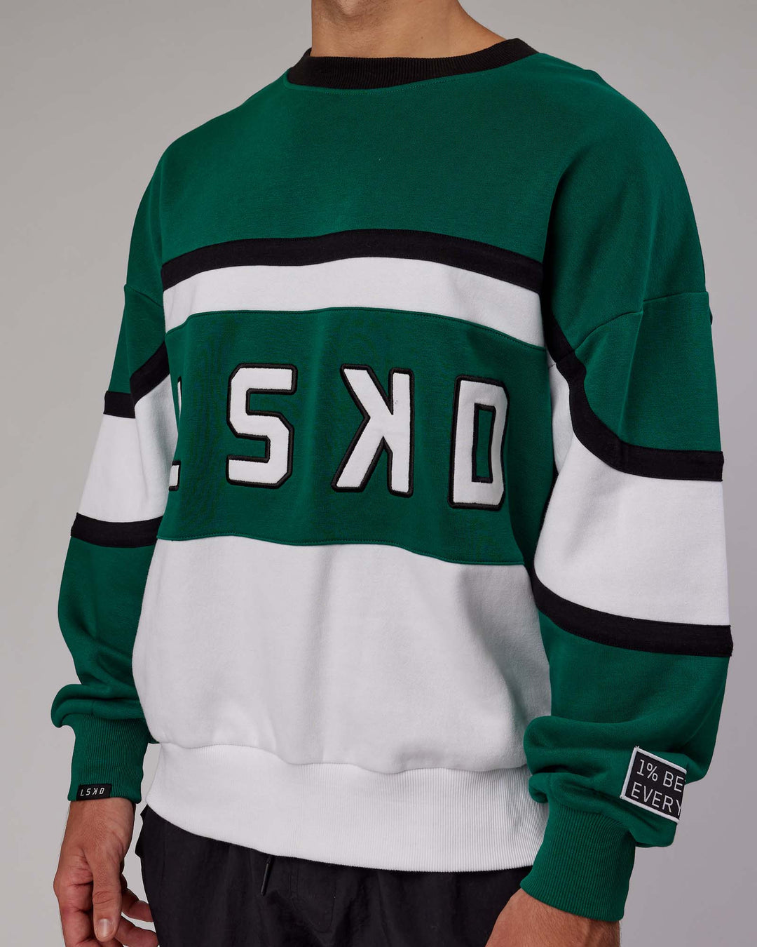 Man wearing Unisex PrimeTime Sweater Oversize - Malachite-White - view 12