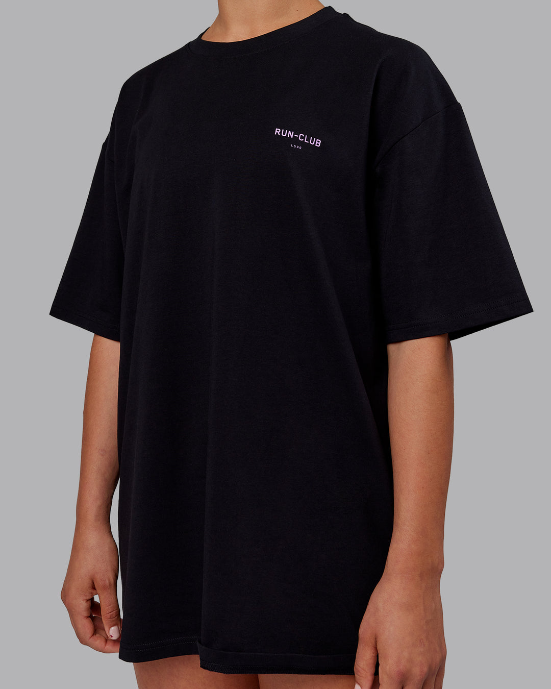 Woman wearing Unisex RUN CLUB FLXCotton Tee Oversize - Black-Purple Swirl - view 9