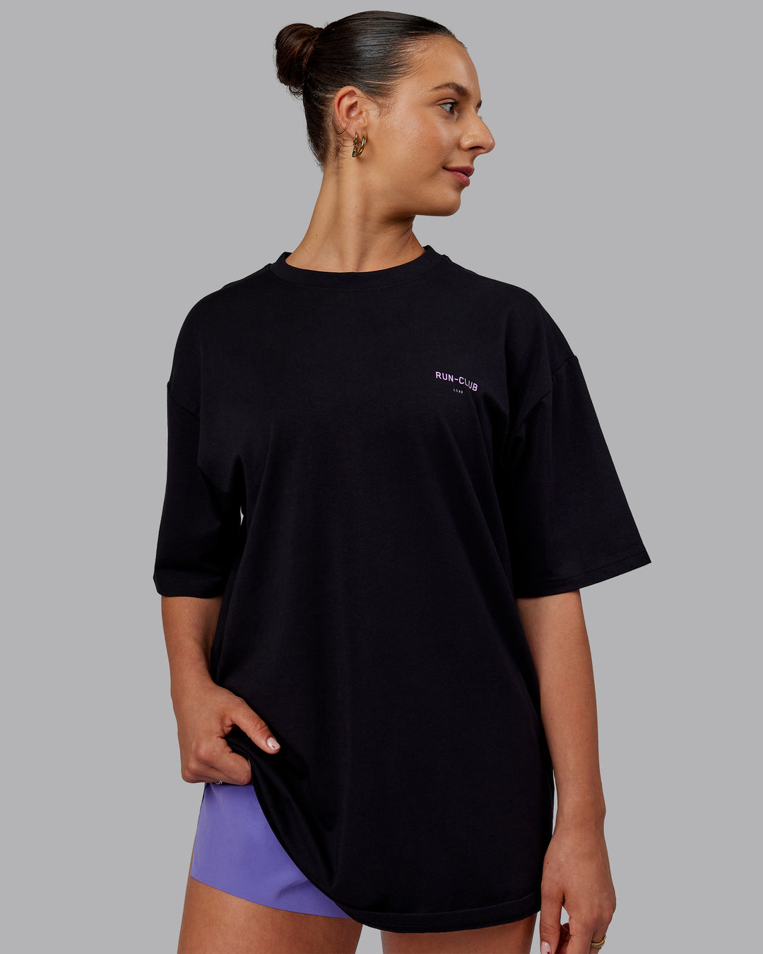 Woman wearing Unisex RUN CLUB FLXCotton Tee Oversize - Black-Purple Swirl - view 4