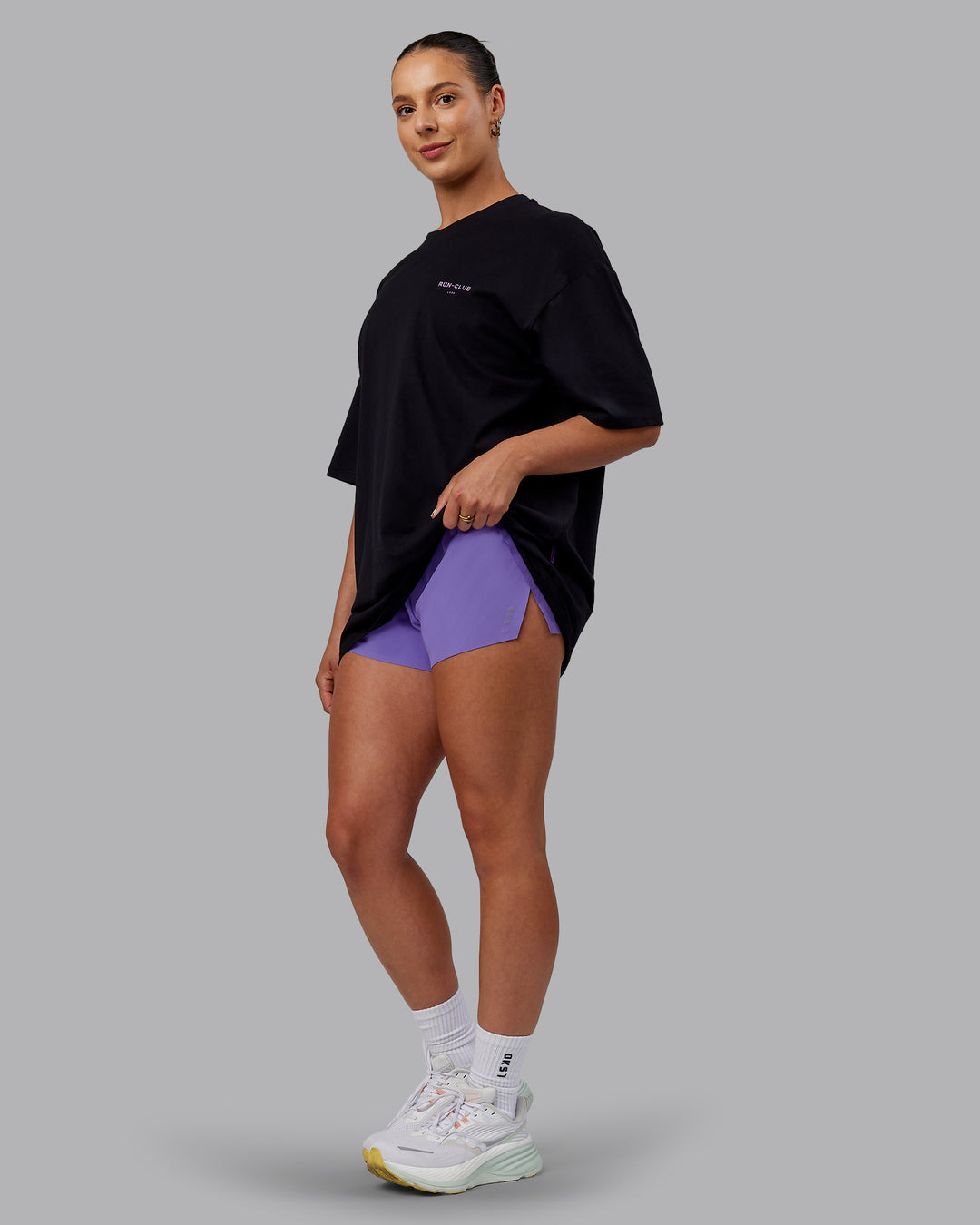 Woman wearing Unisex RUN CLUB FLXCotton Tee Oversize - Black-Purple Swirl - view 5