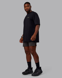 Man wearing Unisex RUN CLUB FLXCotton Tee Oversize - Black-Vol | Thumbnail Index: 5