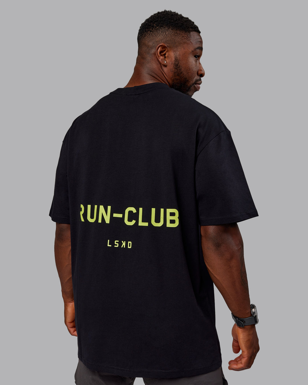 Man wearing Unisex RUN CLUB FLXCotton Tee Oversize - Black-Vol - view 10