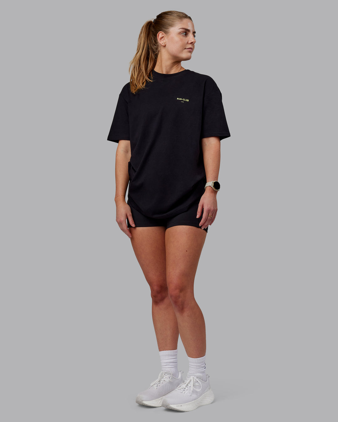 Woman wearing Unisex RUN CLUB FLXCotton Tee Oversize - Black-Vol - view 8