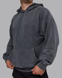 Man wearing Unisex Washed Set the Standard Hoodie Oversize - Black-Greyish Purple | Thumbnail Index: 8
