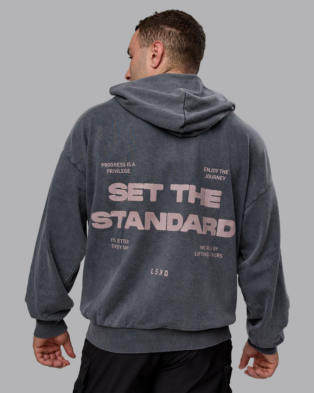 Man wearing Unisex Washed Set the Standard Hoodie Oversize - Black-Greyish Purple - view 2