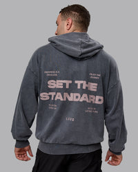 Man wearing Unisex Washed Set the Standard Hoodie Oversize - Black-Greyish Purple | Thumbnail Index: 1